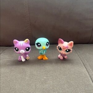 Littlest Pet Shop Purple Cat, Blue Bird, and Pink Cat Figures